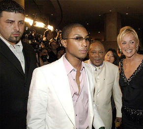 Pharrell with boduguard